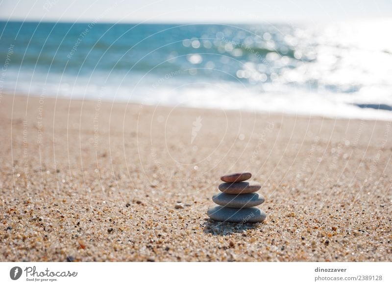 Stones stack on the sand Wellness Harmonious Relaxation Meditation Spa Summer Beach Ocean Nature Sky Horizon Rock Coast Natural Blue Black White Colour