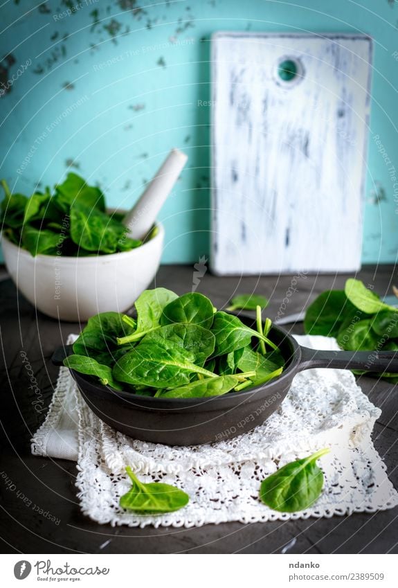 fresh green spinach leaves Vegetable Lettuce Salad Herbs and spices Nutrition Vegetarian diet Diet Plate Bowl Pan Table Nature Plant Leaf Wood Eating Fresh