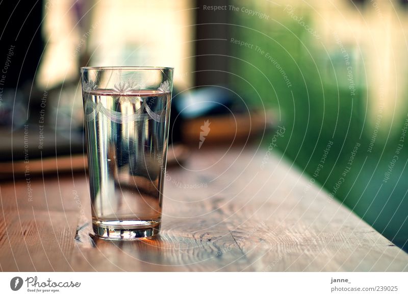 thirsty Beverage Cold drink Drinking water Glass Wood Water Fluid Brown Green Wetzlar Table Colour photo Interior shot Light Shadow Reflection Back-light Blur