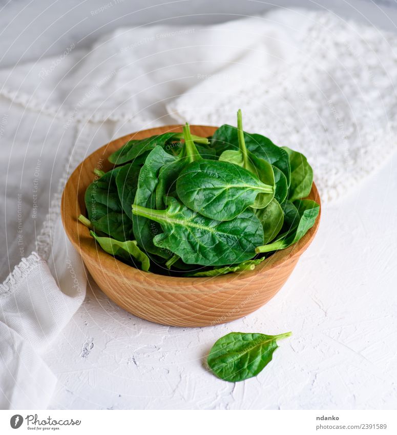 green spinach leaves Vegetable Lettuce Salad Herbs and spices Vegetarian diet Plate Bowl Table Nature Plant Leaf Wood Fresh Natural Green White Spinach food