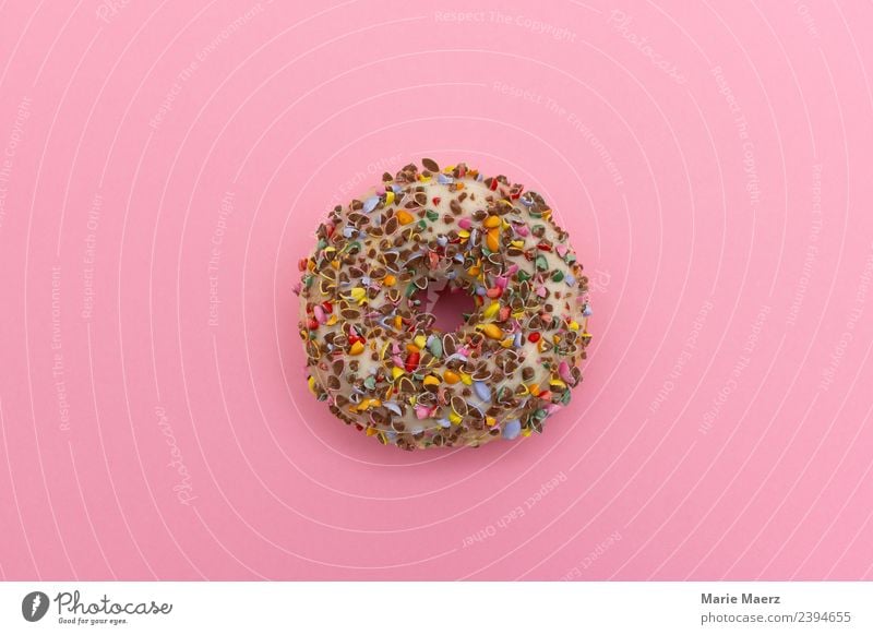 Delicious donut with chocolate crumbs Food Dough Baked goods Cake Dessert Nutrition Eating Breakfast Fresh Happy Round Juicy Sweet Multicoloured Pink Appetite