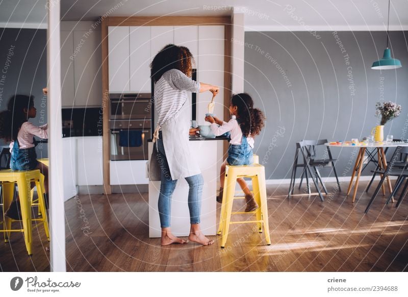 mother and daughter baking cupcakes in kitchen together Lifestyle Joy Happy Kitchen Child Woman Adults Parents Mother Family & Relations Infancy Make Together