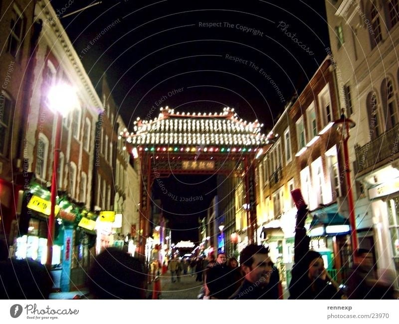 Chinatown London Tourism Store premises Restaurant Main street Pedestrian precinct Archway Passage Canopy Roof Chinese Going out Lamp Electric bulb