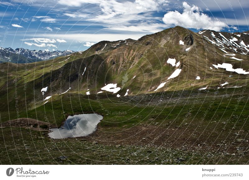 Summer in the mountains Relaxation Trip Freedom Snow Mountain Environment Nature Landscape Elements Sky Beautiful weather Rock Alps Peak Snowcapped peak Davos