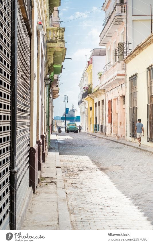 pretty colorful alleyway in Havana with view to the harbour Cuba Island Vacation & Travel Travel photography Trip Sightseeing Street Alley Town Blue sky