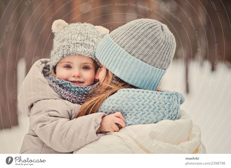 happy family on winter walk Lifestyle Joy Playing Vacation & Travel Winter Snow Child Toddler Parents Adults Mother Family & Relations Friendship Infancy
