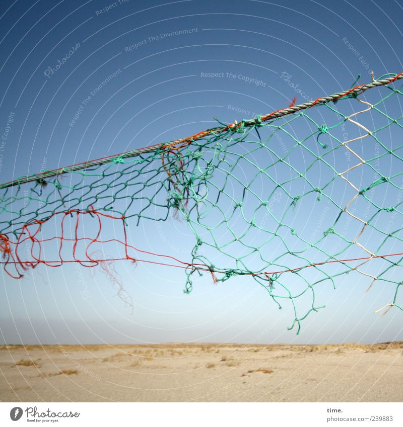 Spiekeroog | Battlefield Beach Sand Sky String Net Old Tall Broken Volleyball net Torn Defective Diagonal Gust of wind Shabby Worn out Derelict Weathered