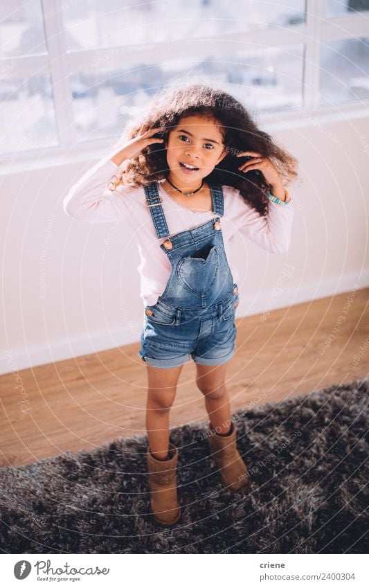 african little girl standing on carpet at home Happy Beautiful Child Infancy Stand Small Cute Loneliness Home American Delightful hair Horizontal kid Curly