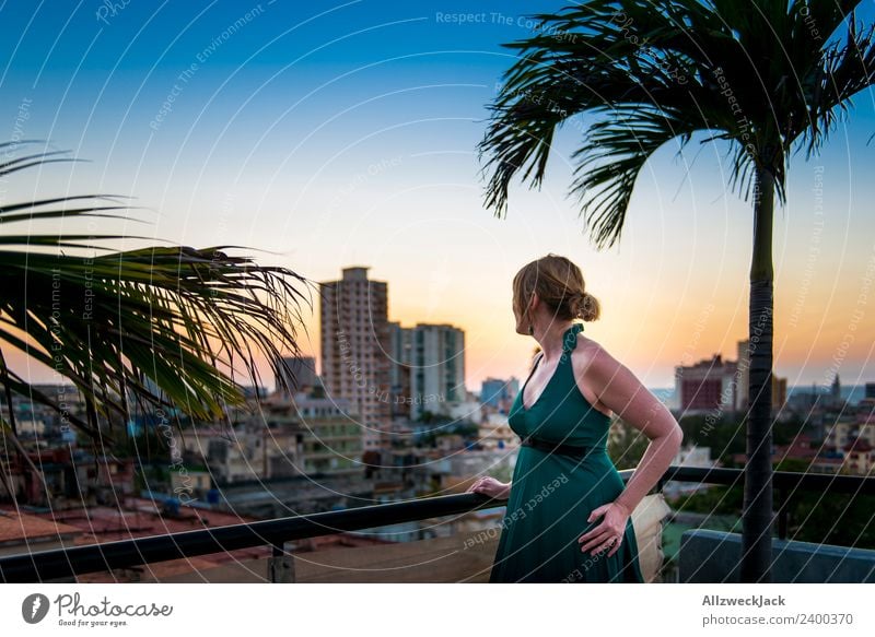 Woman on terrace with view over Havana in Cuba Panorama (View) Sunset Summer Card Vacation & Travel Dusk Vantage point Skyline Palm tree Island