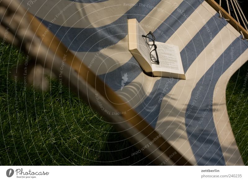 read Relaxation Print media Book To swing Hammock Eyeglasses Stripe Colour photo Exterior shot Deserted Day Deep depth of field Striped 1 Struck Blue White