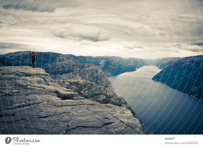plateau 1 Human being Rock Mountain Peak Fjord Joy Power Adventure Far-off places Target Norway Lysefjord Hiking Pride Subdued colour Exterior shot