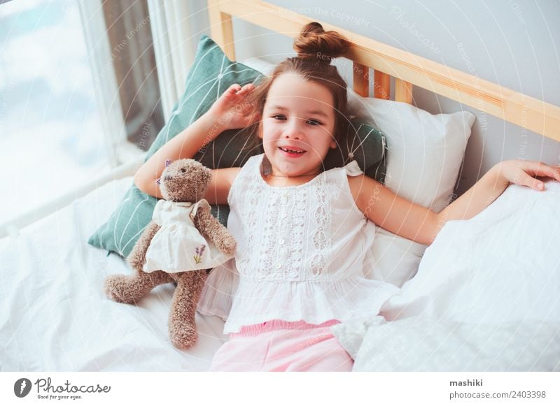 vertical portrait of happy 10 years old preteen girl at home - a Royalty  Free Stock Photo from Photocase