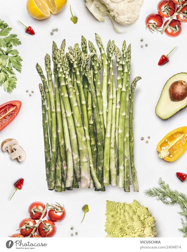 Green asparagus and vegetables on white Food Vegetable Nutrition Organic produce Vegetarian diet Diet Style Design Healthy Healthy Eating Restaurant Asparagus