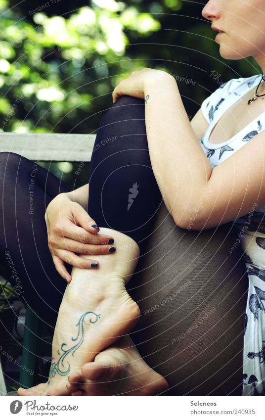 300 - short break Human being Woman Adults Head Arm Legs Feet 1 Tights Sit Tattooed Curlicue Colour photo Exterior shot Day Full-length Ankle