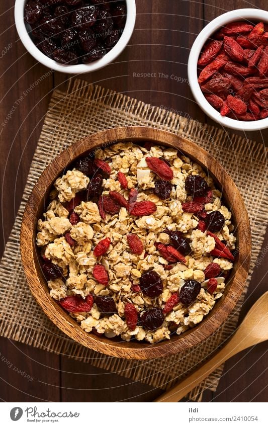 Crunchy Oatmeal Cereal with Almond and Dried Berries Fruit Breakfast Healthy food oatmeal goji wolfberry Cowberry dry Snack Meal brunch Mix sweet antioxidant