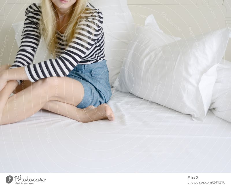 comfortable Bed Bedroom Human being Feminine Young woman Youth (Young adults) Legs 1 18 - 30 years Adults Clothing Skirt Hair and hairstyles Blonde Sit Bright