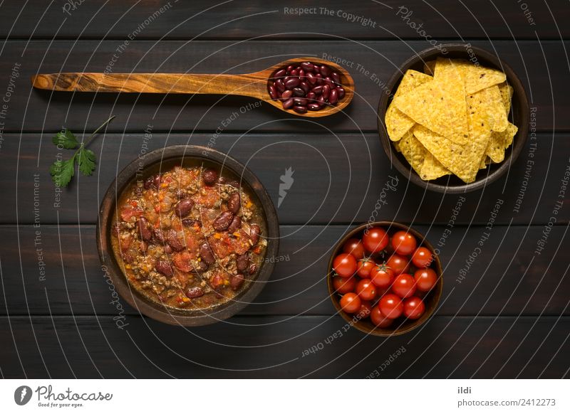 Chili con Carne and Tortilla Chips Meat Vegetable Fresh chili carne food Meal Dish Beef Ground minced mincemeat Beans Pulse legume Tomato stew Home-made Rustic