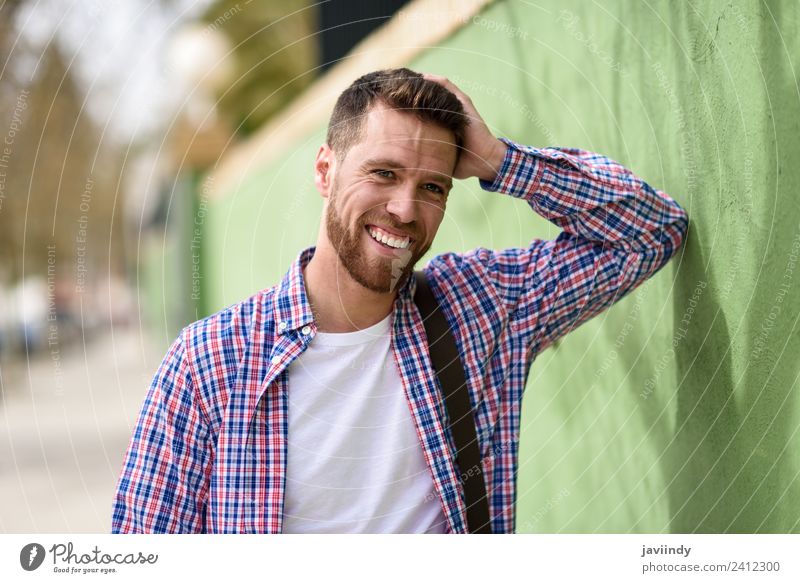 Attractive young man laughing outdoors. Lifestyle Style Happy Vacation & Travel Human being Masculine Young man Youth (Young adults) Man Adults 1 18 - 30 years