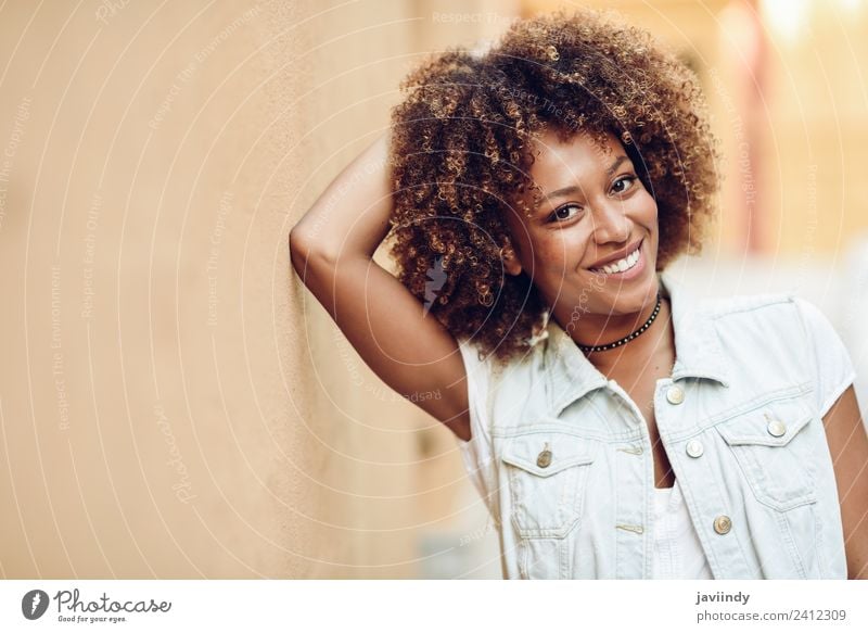 Premium Photo  Charming smiling afroamerican girl with messy hair