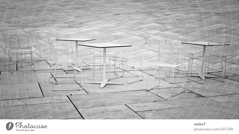 Chairs back II Stone Cold Gray White Norway Oslo Table Terrace Black & white photo Exterior shot Deserted