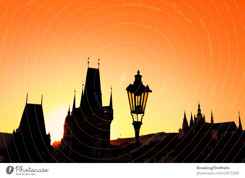 Sunset backlit silhouettes of roofs at Charles Bridge in Prague Vacation & Travel Tourism Sightseeing City trip Cloudless sky Town Old town Skyline Church Dome
