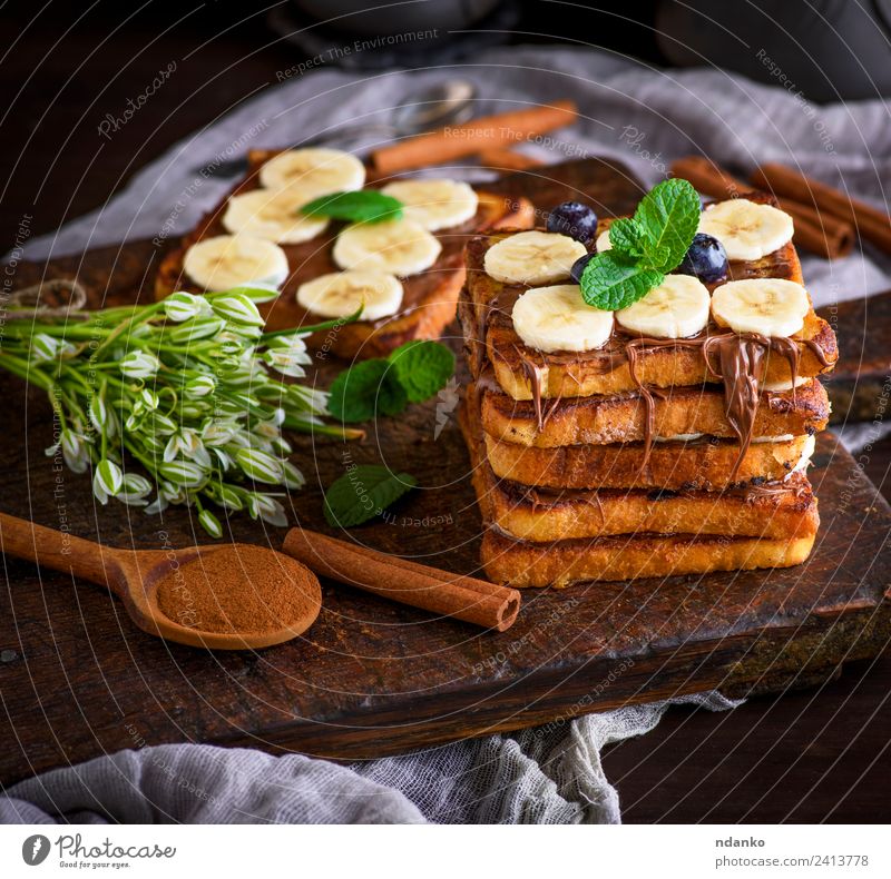 French toast for breakfast Fruit Bread Dessert Nutrition Breakfast Spoon Flower Wood Fresh Delicious Above Tradition french Banana chocolate background food