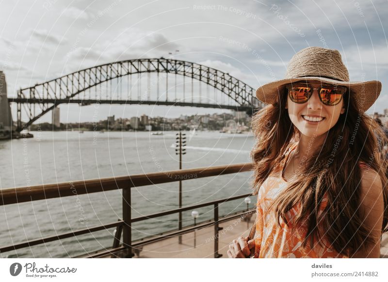 Beautiful girl with a hat and sunglasses posing in Sydney, with Harbour Bridge in the background. Lifestyle Vacation & Travel Trip Sightseeing Human being