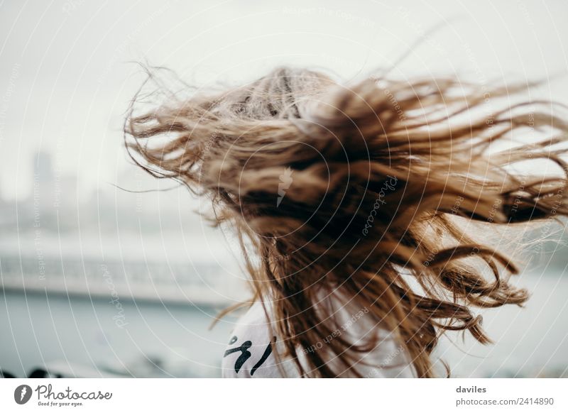 Woman with the hair flying in the air because of the wind Joy Beautiful Face Freedom Summer Human being Feminine Young woman Youth (Young adults) Adults 1