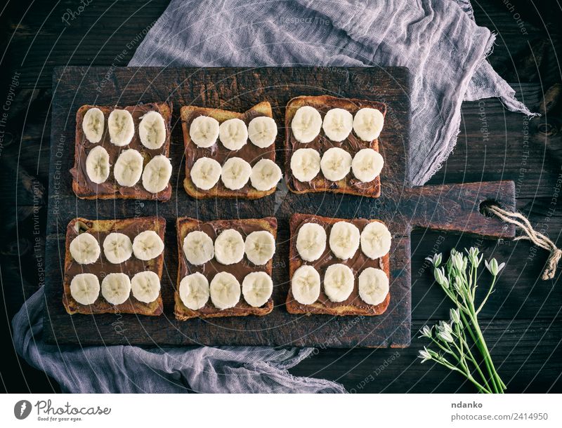French toasts with chocolate Fruit Bread Dessert Candy Nutrition Breakfast Flower Wood Eating Fresh Delicious Above Brown Tradition french Banana background