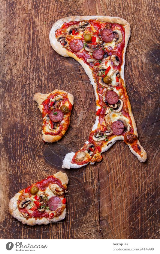 Pizza in the shape of the Italian peninsula Meat Sausage Cheese Dough Baked goods Dinner Table Boots Wood Speed Peninsula Chili Sardinia country