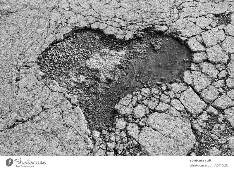 Street-Heart Road traffic Lanes & trails Romance Asphalt Tar Crumbs To break (something) Broken Pothole romantic Black & white photo Exterior shot Deserted
