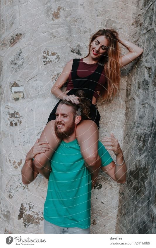 Woman sitting on her boyfriend shoulders. Lifestyle Joy Vacation & Travel Trip Human being Adults Man Couple 2 18 - 30 years Youth (Young adults) Dancer