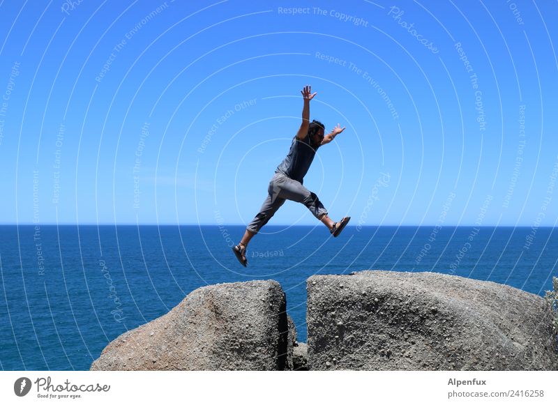 Stone buck ig Human being Masculine Man Adults 1 30 - 45 years Rock Ocean Indian Ocean Flying Jump Tall Athletic Joy Joie de vivre (Vitality) Success Brave