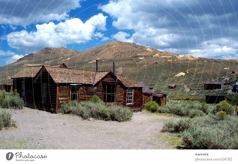 ghost town Village Americas South West Loneliness Mine Ghost town Clouds Desert Sparse USA Wooden house Wooden hut Clouds in the sky Deserted Vacancy