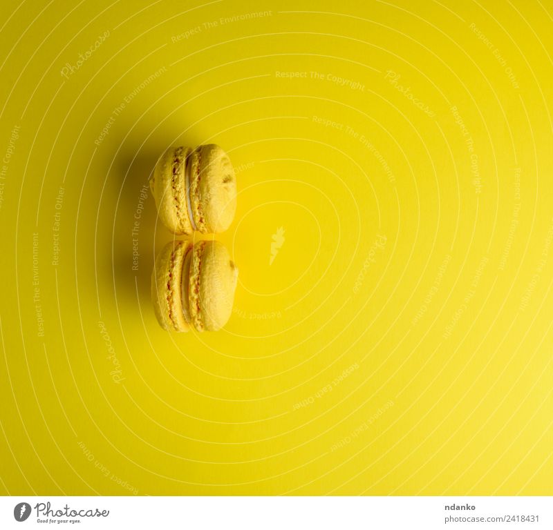 two yellow macarons Dessert Candy Bright Yellow Colour Tradition Macaron Baked goods Almond assortment background Baking Bakery biscuit cake colorful