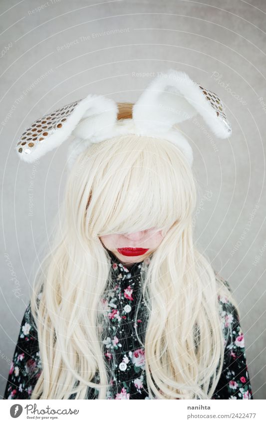 Sad blonde woman wearing bunny ears Style Exotic Hair and hairstyles Lipstick Human being Feminine Young woman Youth (Young adults) 1 18 - 30 years Adults