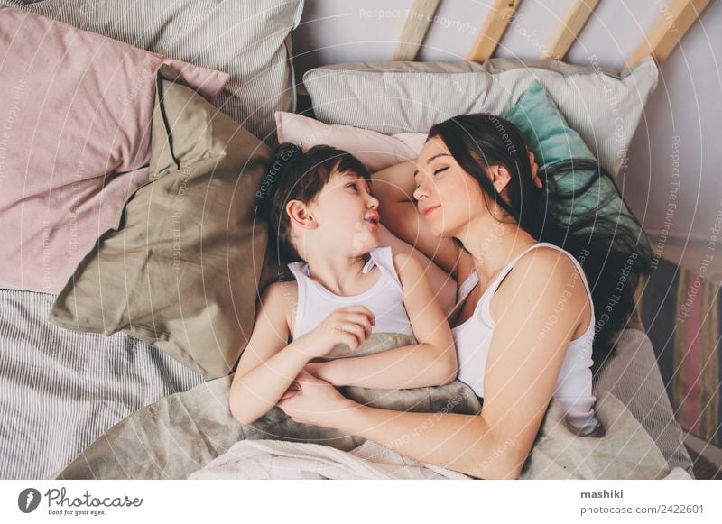 Mother And Child Son Sleeping Together In Bed A Royalty Free Stock Photo From Photocase