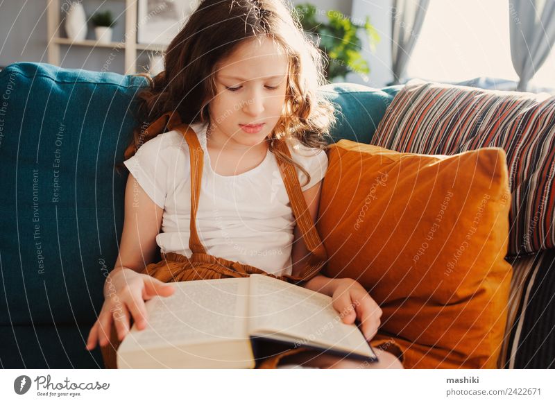 smart kid girl reading interesting book Lifestyle Relaxation Reading Child School Study Schoolchild Infancy Book Small Smart Loneliness Comfortable Home