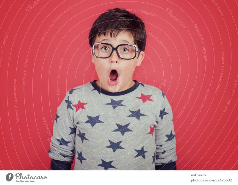 surprised boy with glasses Human being Masculine Child Toddler Boy (child) Infancy 1 8 - 13 years Eyeglasses Movement Think Fitness Smiling Cool (slang)