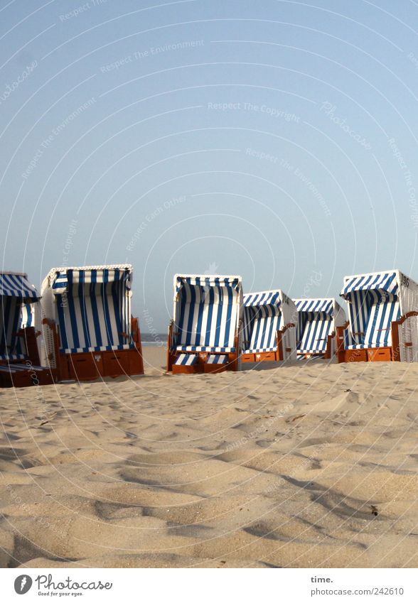 Spiekeroog. Waiting for customers. Well-being Relaxation Vacation & Travel Tourism Summer Beach 6 Human being Sky Coast Stripe Sit Thin Blue White Beach chair