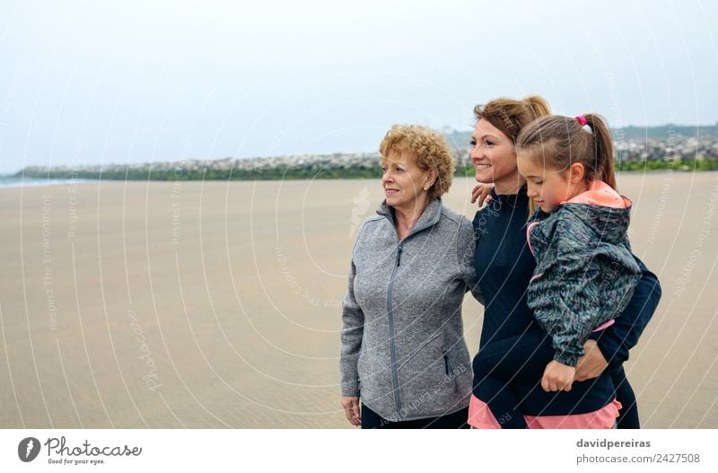 Three women looking at sea on the beach Lifestyle Joy Happy Beautiful Beach Ocean Child Human being Woman Adults Mother Grandfather Grandmother