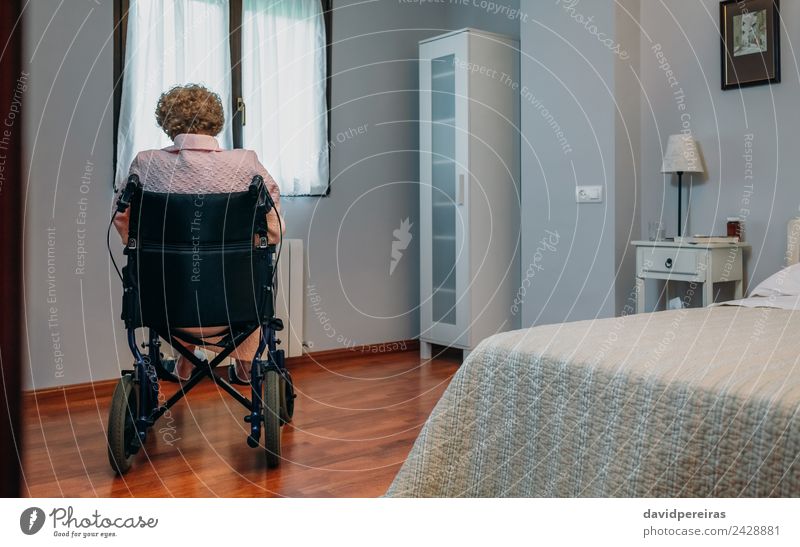 Senior woman in wheelchair alone in room Lifestyle Health care Illness Medication Relaxation Hospital Retirement Human being Woman Adults Old Sit Sadness