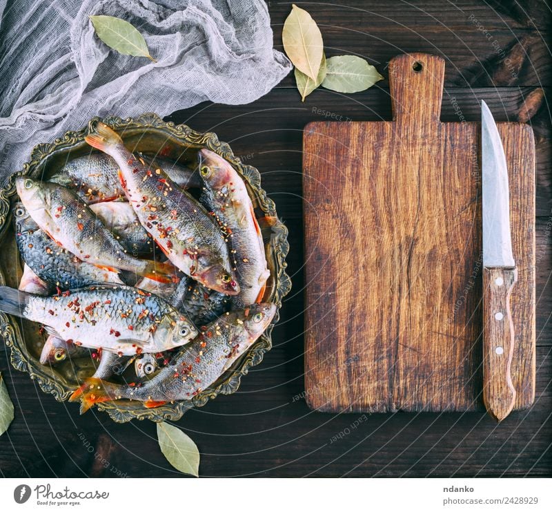 river fish perch and crucian Fish Seafood Herbs and spices Nutrition Dinner Diet Plate Knives Table Animal River Wood Dark Fresh Above Retro Brown Black Perches