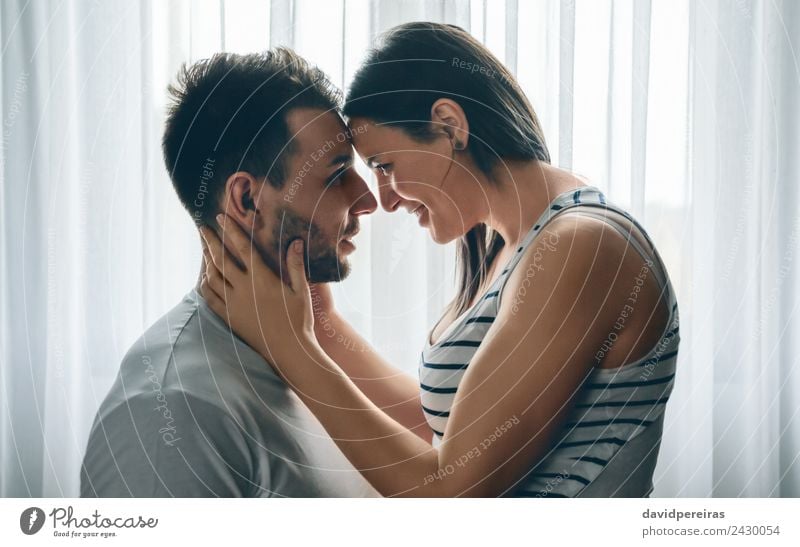 Embracing couple looking into eyes Lifestyle Happy Beautiful Human being Woman Adults Man Family & Relations Couple Beard Smiling Love Embrace Happiness