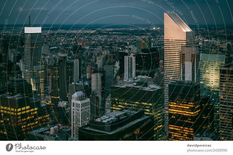 Skyline of Manhattan at night with skyscrapers lights Design Wallpaper Workplace Office Business Downtown High-rise Building Architecture Facade Aircraft Steel
