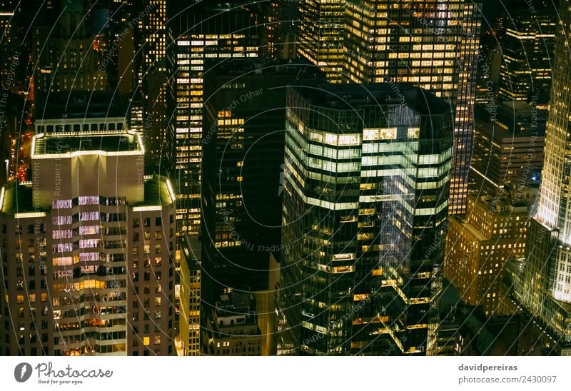 Skyscrapers windows illuminated at night in Manhattan Design Wallpaper Workplace Office Business Downtown Skyline High-rise Building Architecture Facade
