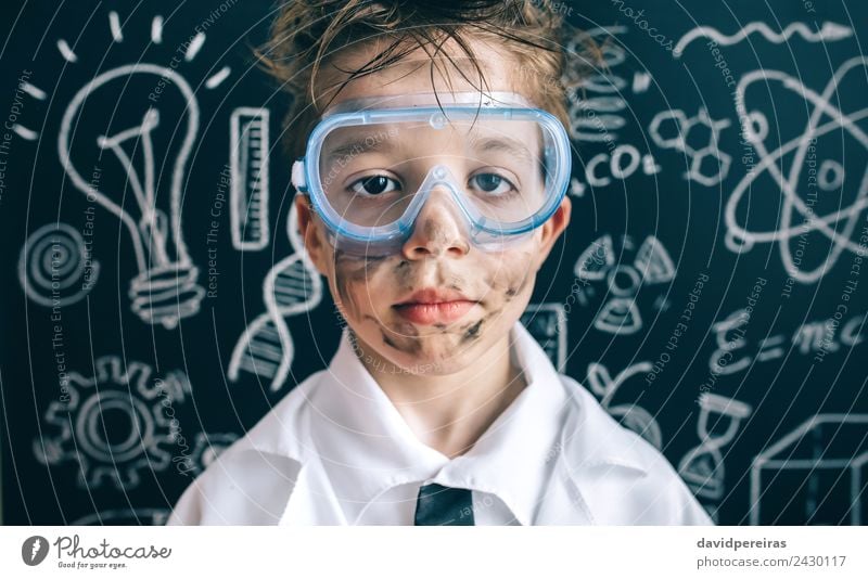 Little chemist in glasses looking seriously at camera Face Flat (apartment) Science & Research Child School Classroom Blackboard Laboratory Human being