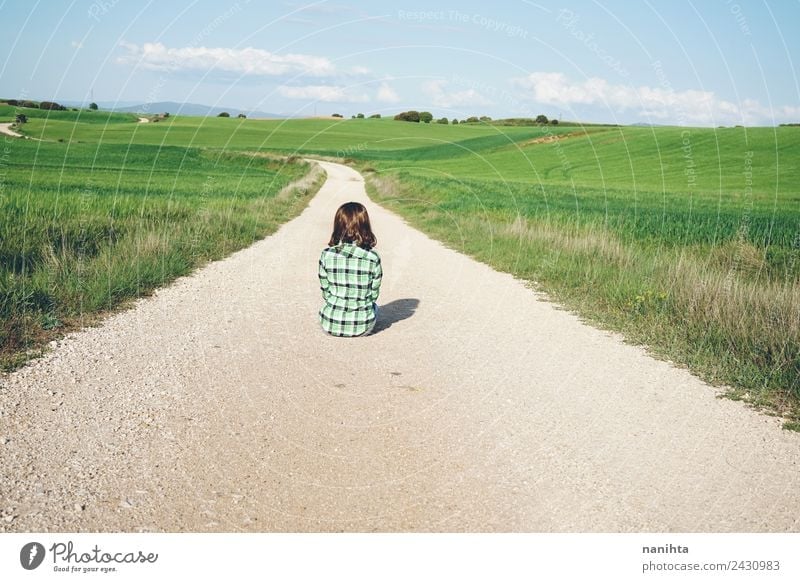 Young woman sitting alone in a rural path Lifestyle Style Design Harmonious Relaxation Adventure Far-off places Freedom Human being Feminine