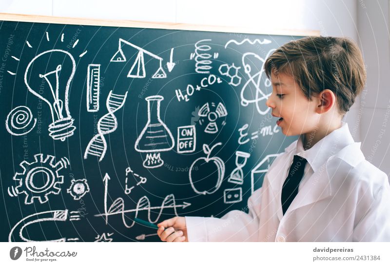 Side view of boy showing drawing on chalkboard Happy Playing Flat (apartment) Science & Research Child Classroom Blackboard Laboratory To talk Human being