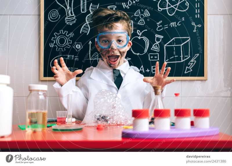 Happy little boy playing excited with experiment results Face Playing Flat (apartment) Table Science & Research Child School Classroom Blackboard Laboratory